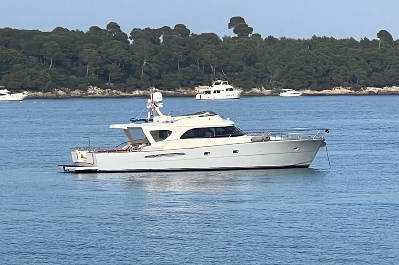 a white yacht in the water aboard NOI TOY Yacht for Sale