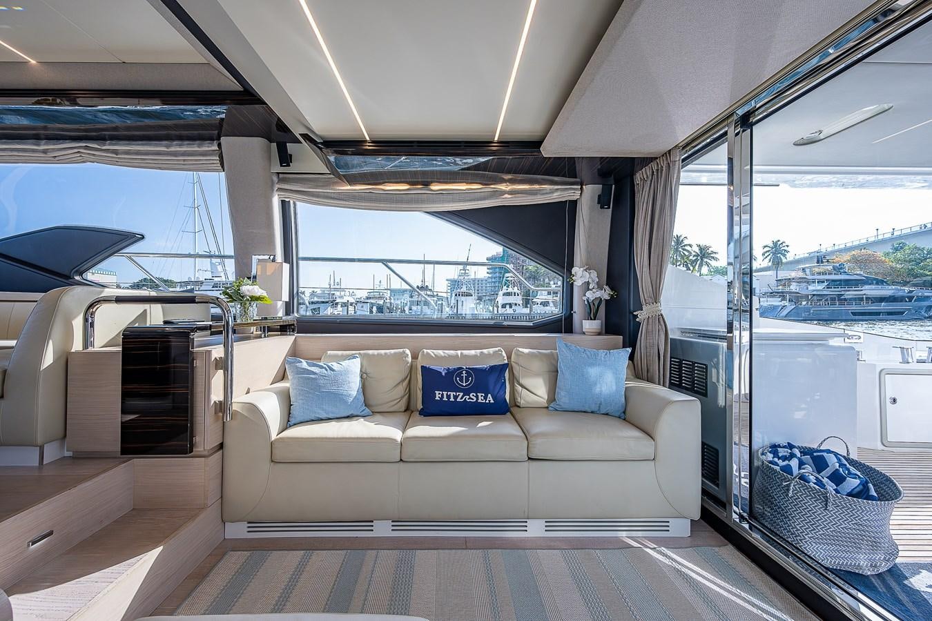 a couch in a room aboard FITZ SEA Yacht for Sale