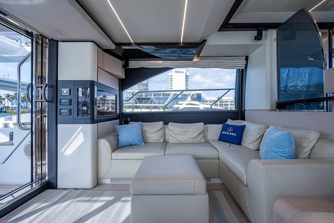 a couch in a room aboard FITZ SEA Yacht for Sale