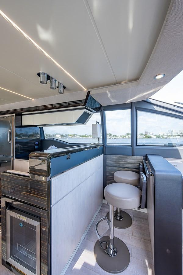 a kitchen with a sink and a window aboard FITZ SEA Yacht for Sale