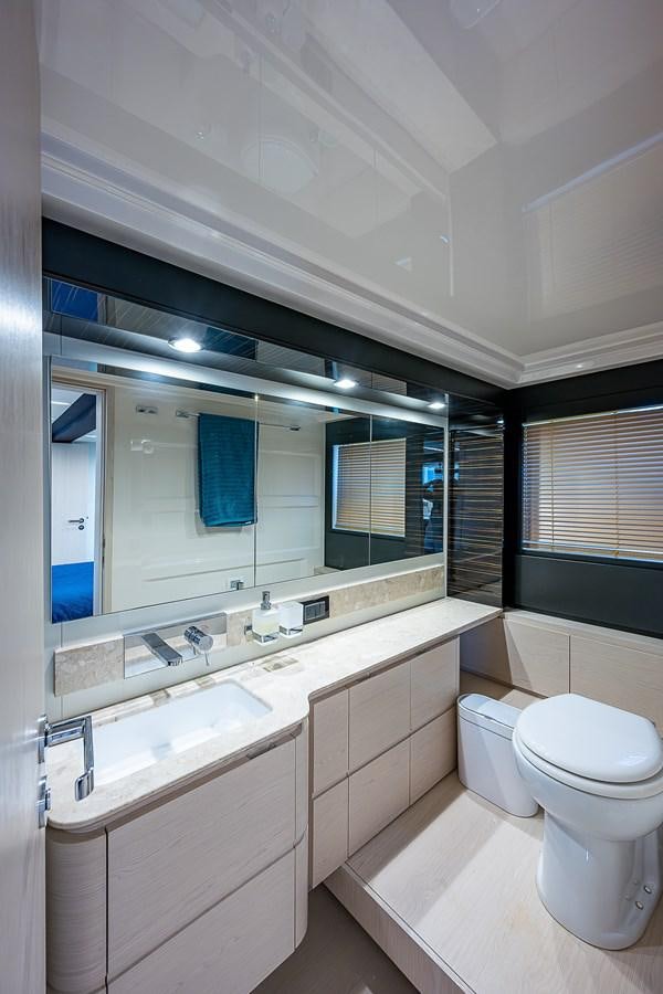 a bathroom with a large mirror aboard FITZ SEA Yacht for Sale