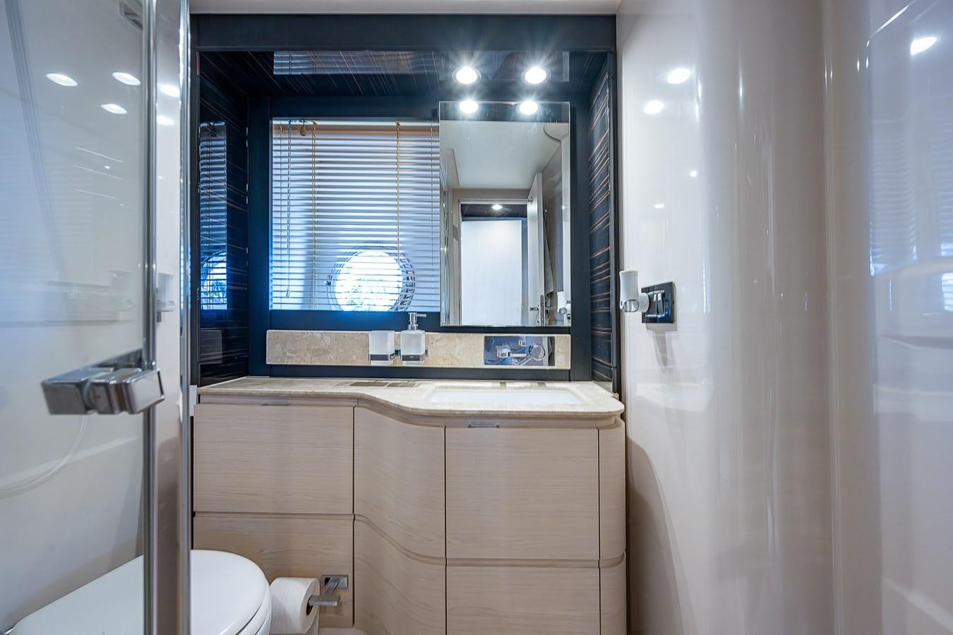 a bathroom with a large mirror aboard FITZ SEA Yacht for Sale