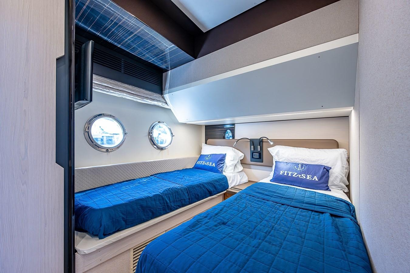 a room with two beds aboard FITZ SEA Yacht for Sale