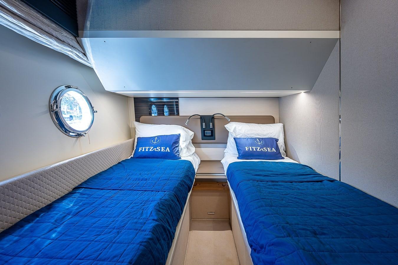 a couple of beds in a room aboard FITZ SEA Yacht for Sale