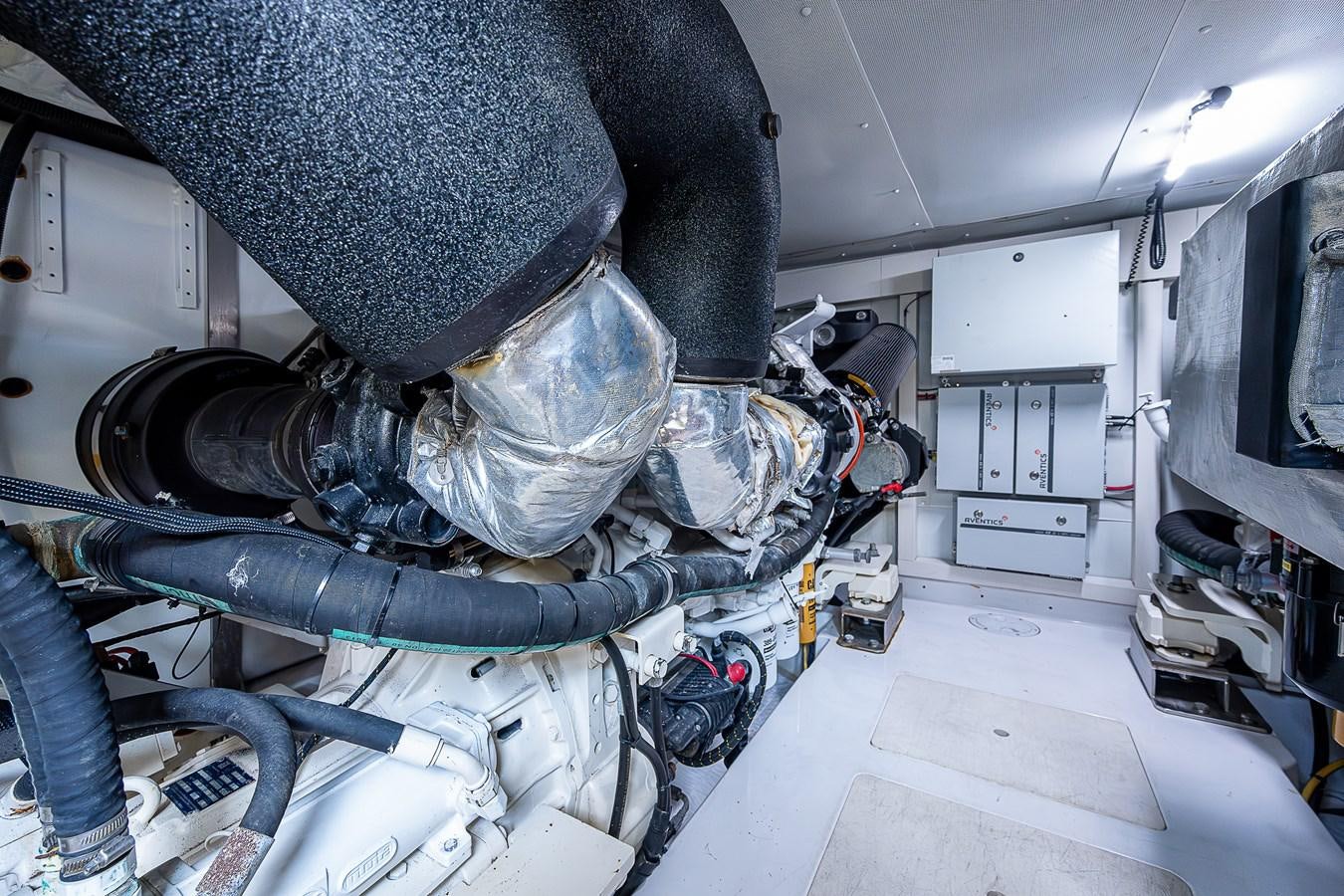 a person in a room with a large metal object aboard FITZ SEA Yacht for Sale