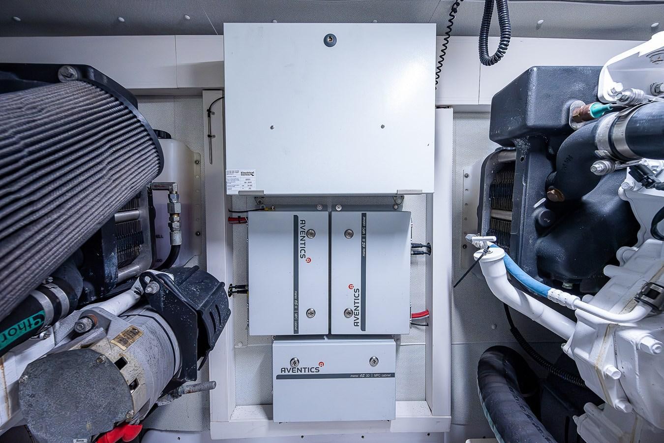 a machine with a large piece of equipment in it aboard FITZ SEA Yacht for Sale