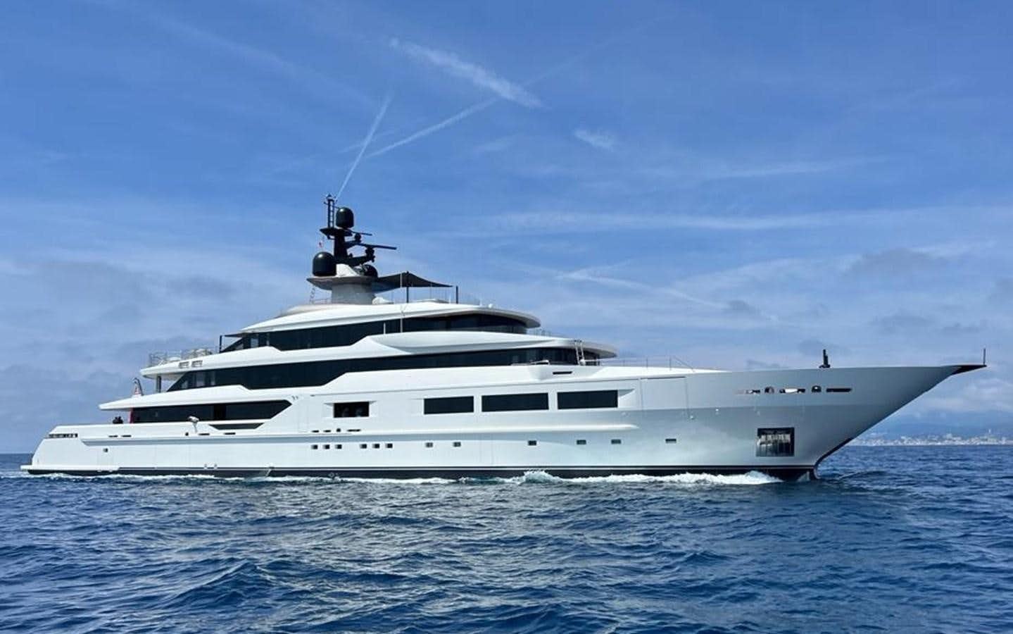 a white yacht in the water aboard CASINO ROYALE Yacht for Sale