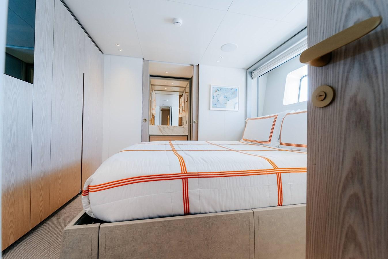 a bed in a room aboard PEARL Yacht for Sale