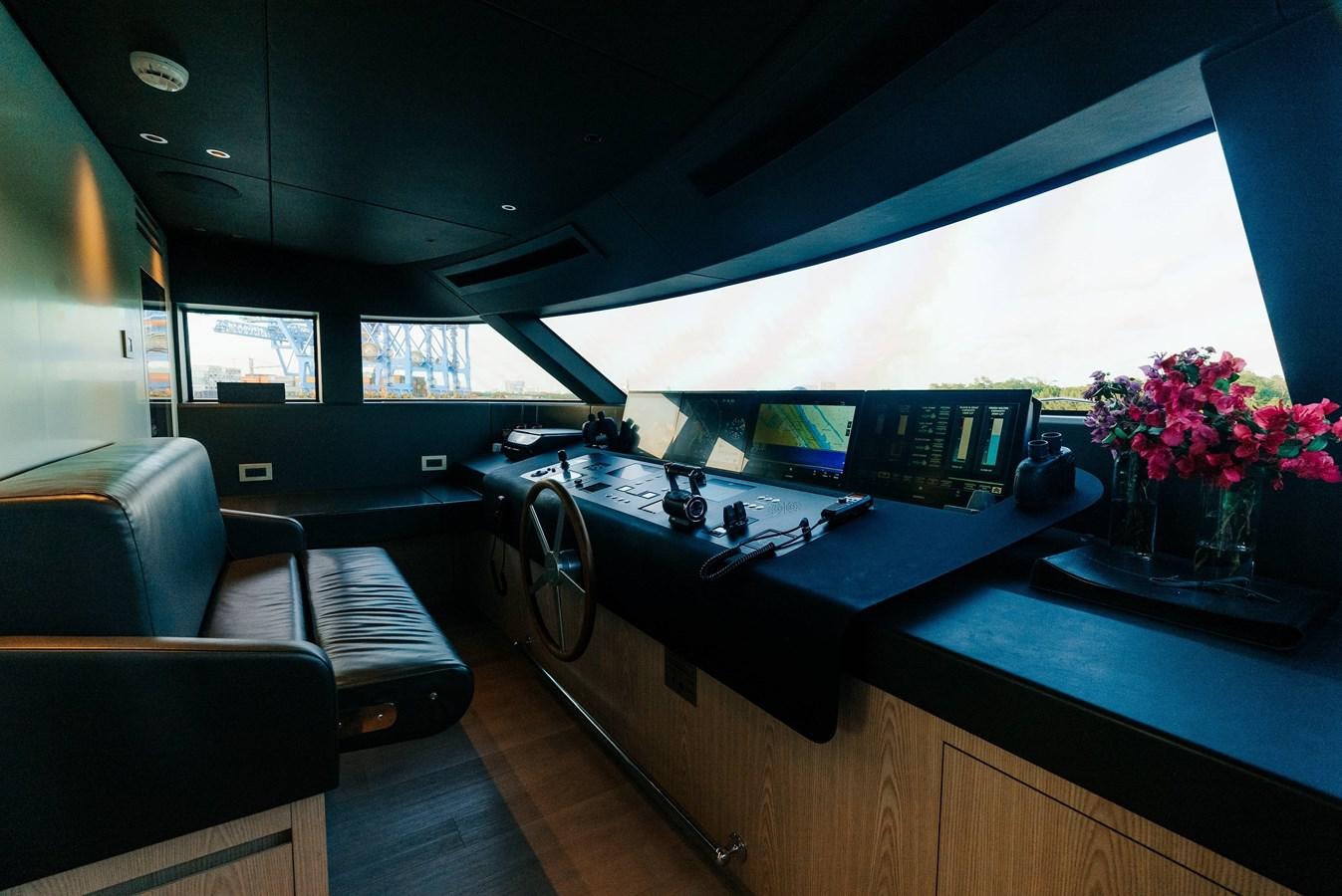 a room with a desk and a computer aboard PEARL Yacht for Sale