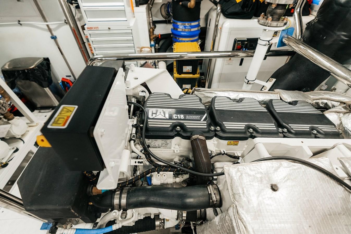 a car engine with a black hood aboard PEARL Yacht for Sale