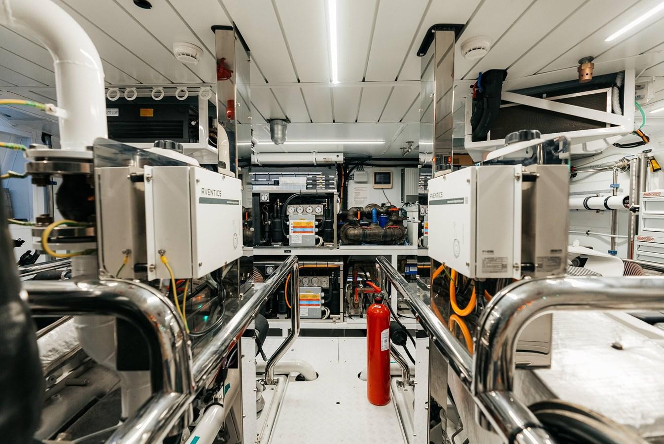 a large machine in a factory aboard PEARL Yacht for Sale