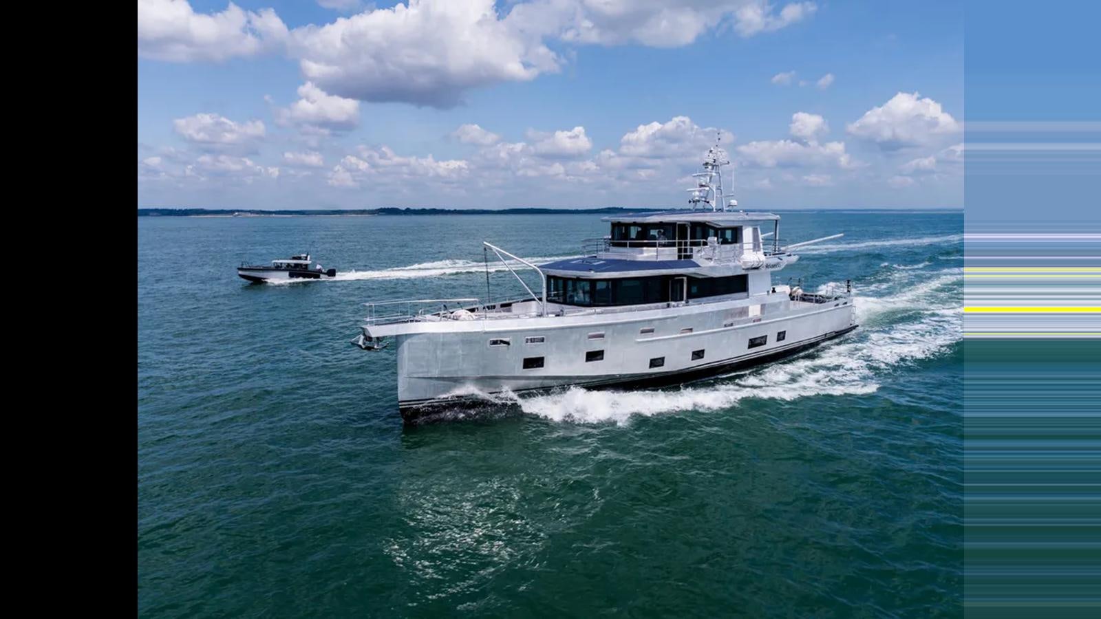 a boat on the water aboard 2024 ARKSEN 85 - SEATTLE Yacht for Sale