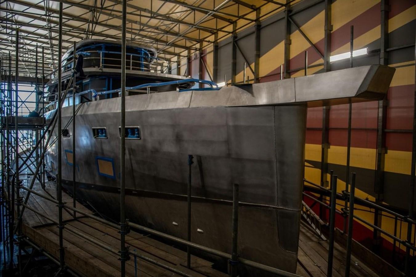 a large metal tube in a warehouse aboard 2024 ARKSEN 85 - SEATTLE Yacht for Sale