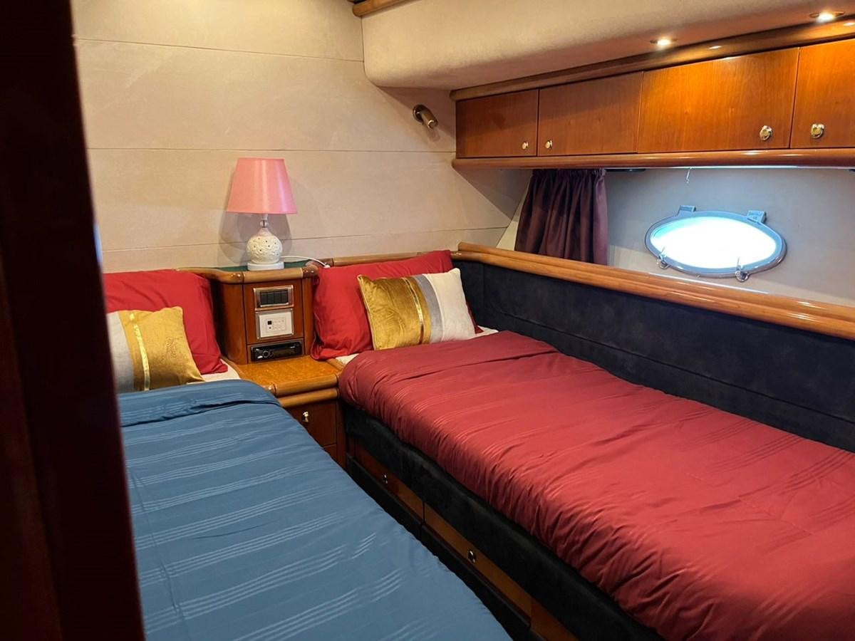 a room with two beds aboard ARTENGO Yacht for Sale