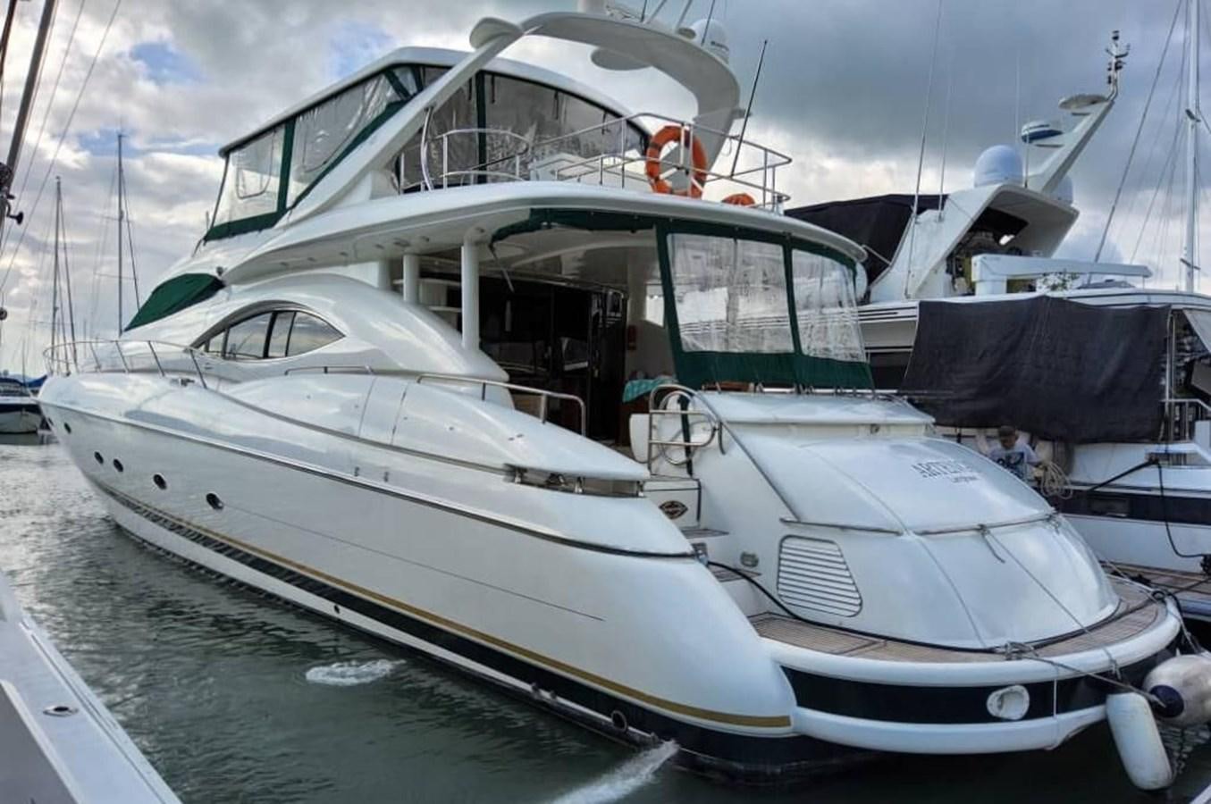 a boat docked in a harbor aboard ARTENGO Yacht for Sale