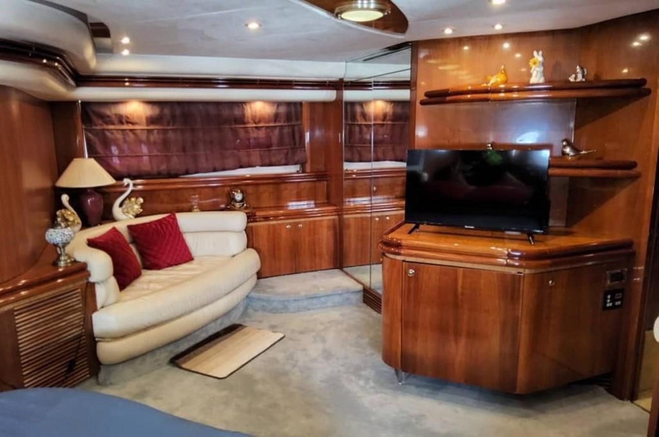 a living room with a fireplace aboard ARTENGO Yacht for Sale