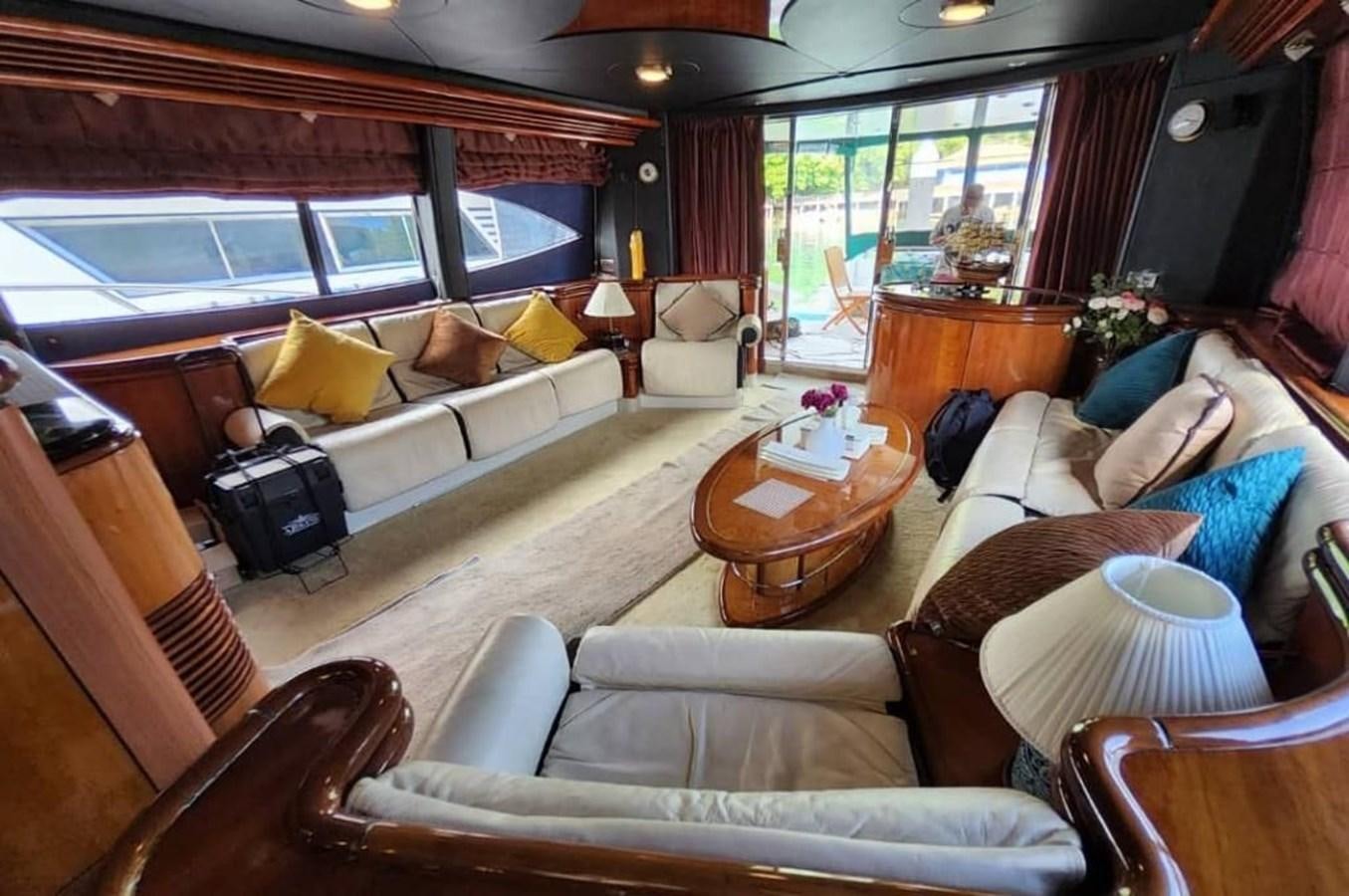 a living room with a large window aboard ARTENGO Yacht for Sale