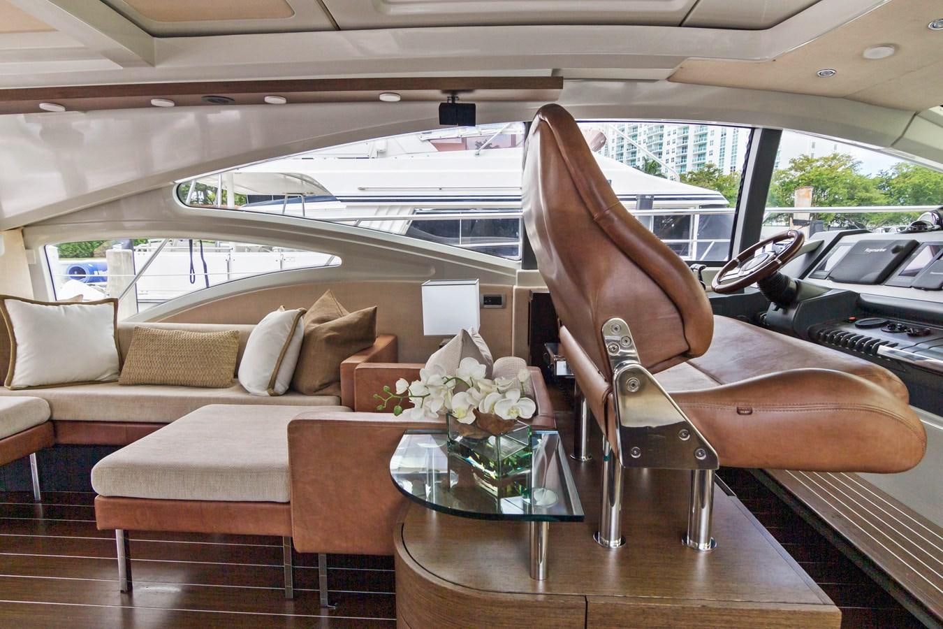 a person bending over a table aboard BLIND SQUIRREL Yacht for Sale