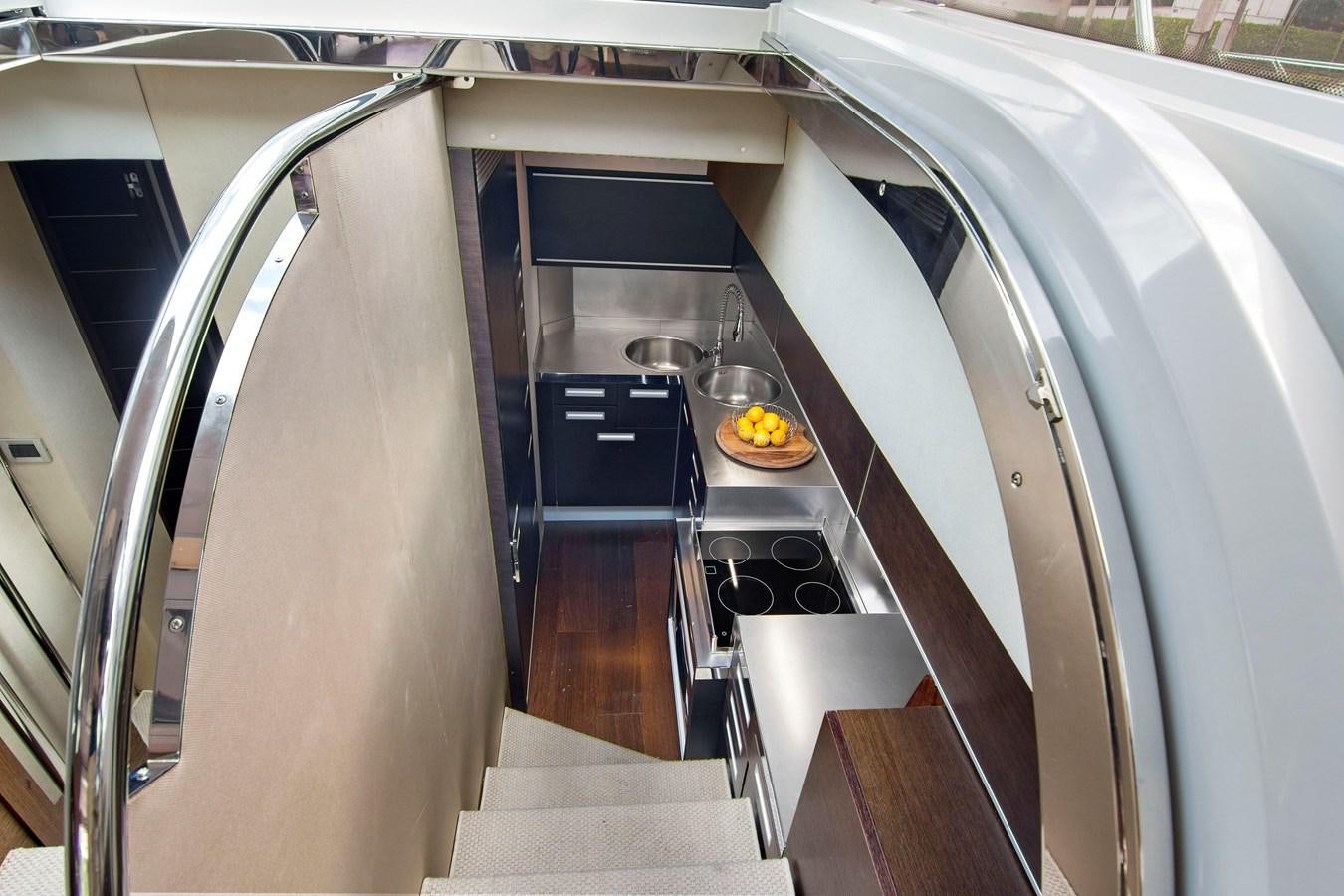 a kitchen with stainless steel appliances aboard BLIND SQUIRREL Yacht for Sale
