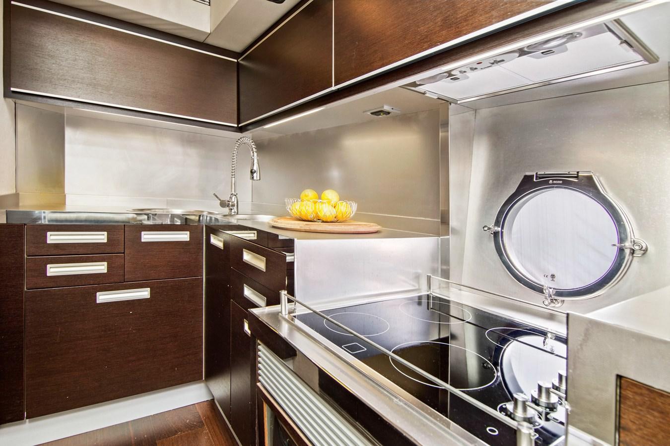 a kitchen with a large mirror aboard BLIND SQUIRREL Yacht for Sale