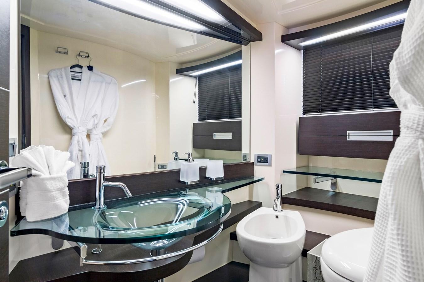 a bathroom with a large mirror aboard BLIND SQUIRREL Yacht for Sale