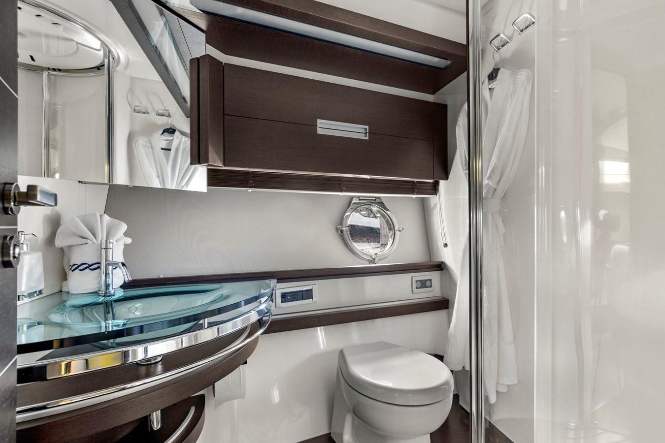 a bathroom with a sink and a toilet aboard BLIND SQUIRREL Yacht for Sale