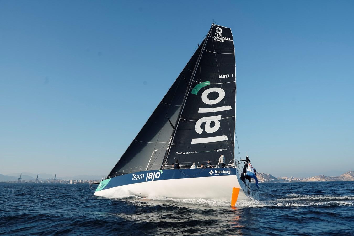 a person on a sailboat aboard VOLVO OCEAN 65 Yacht for Sale