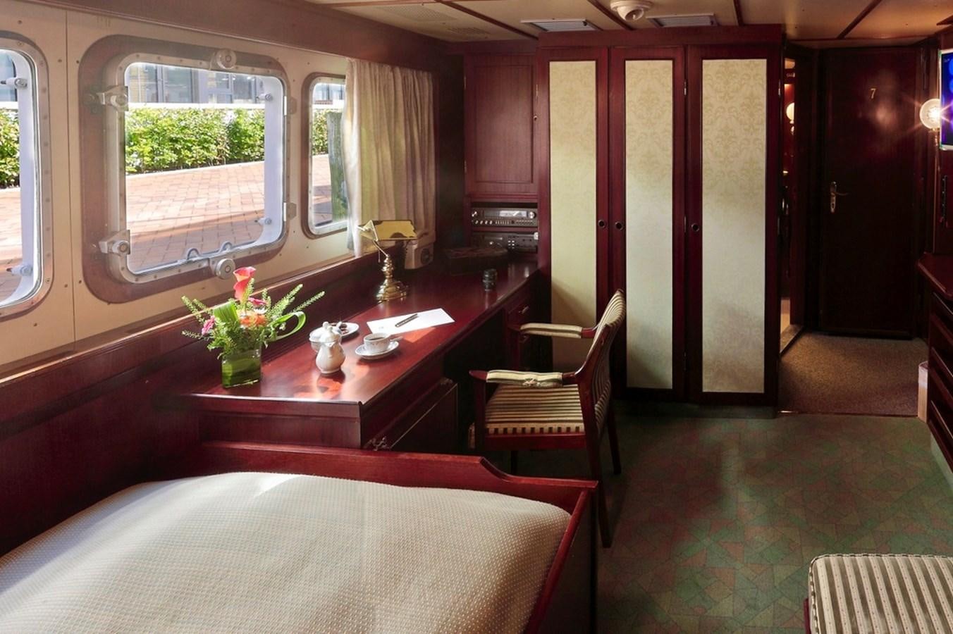 a room with a table and chairs aboard SANSSOUCI STAR Yacht for Sale