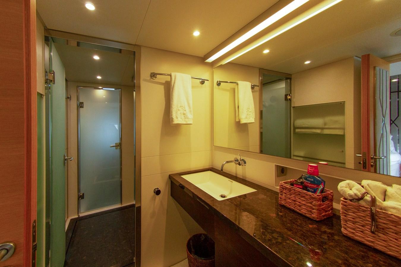 a bathroom with a countertop sink and mirror aboard DARLING Yacht for Sale