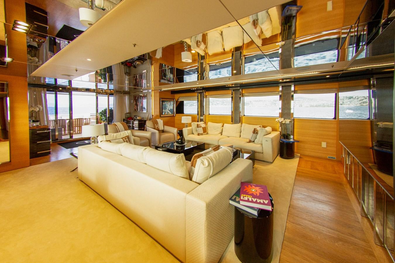a room with a couch and a table aboard DARLING Yacht for Sale