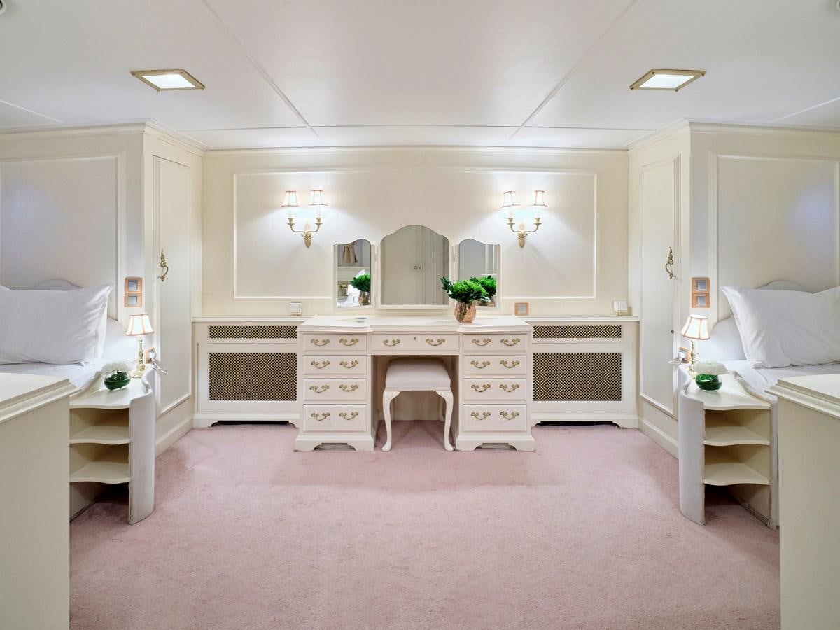 a room with a bed and a desk aboard MIDNIGHT SUN Yacht for Sale