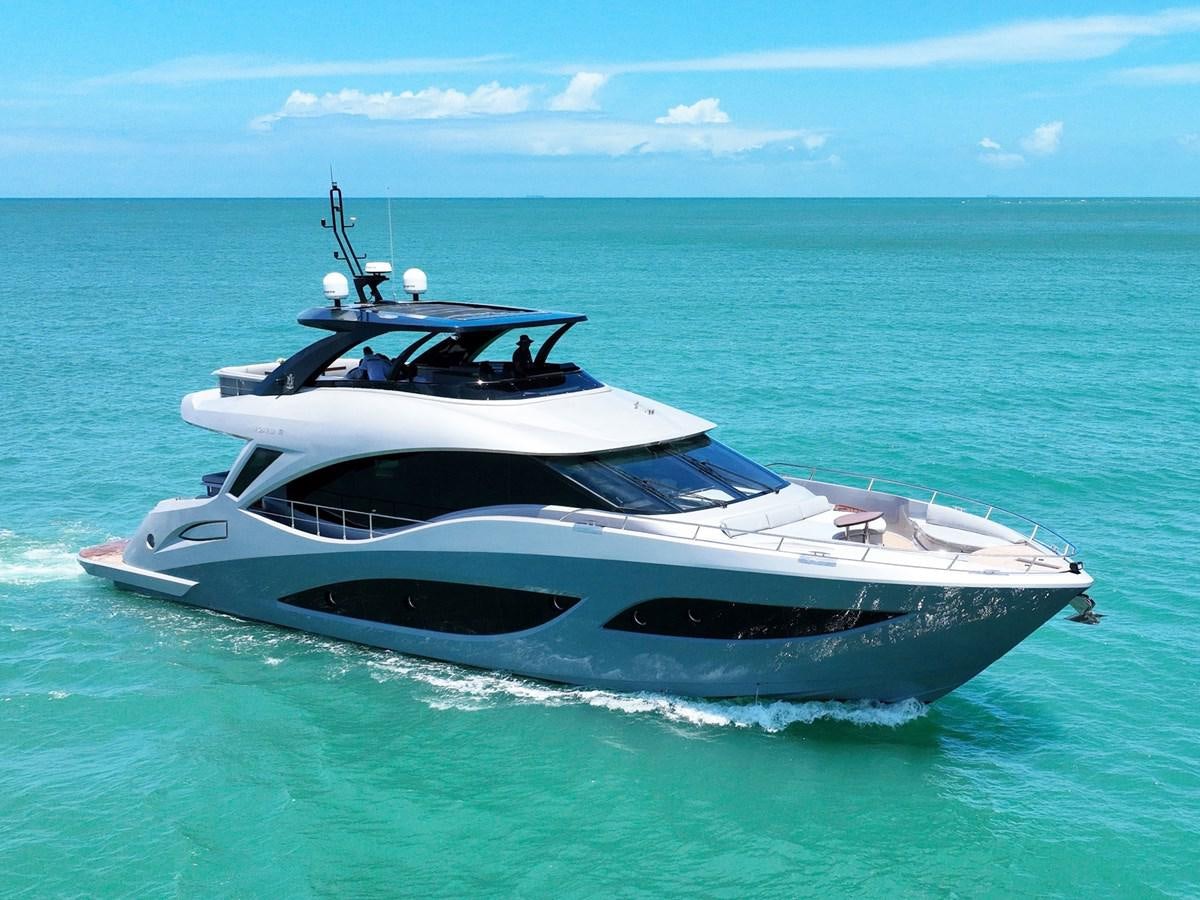 a white yacht in the water aboard DIVA RITA Yacht for Sale