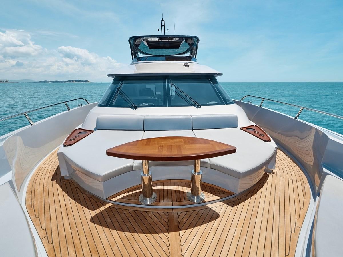 a white car on a boat aboard DIVA RITA Yacht for Sale