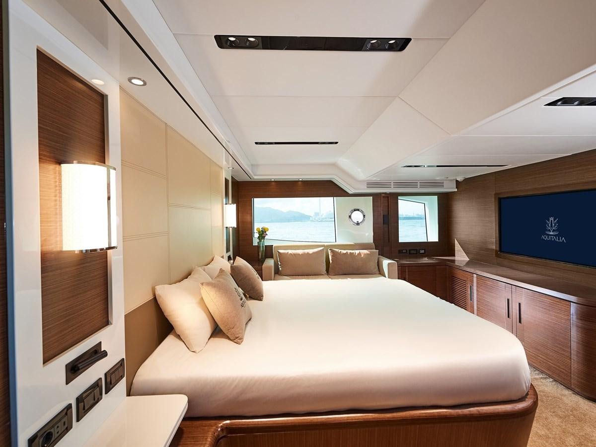 a bedroom with a large bed aboard DIVA RITA Yacht for Sale