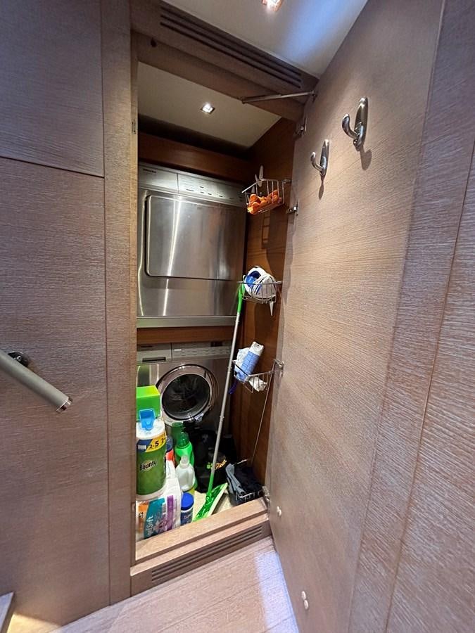 a small refrigerator with a few bottles aboard KIND OF BLUE Yacht for Sale