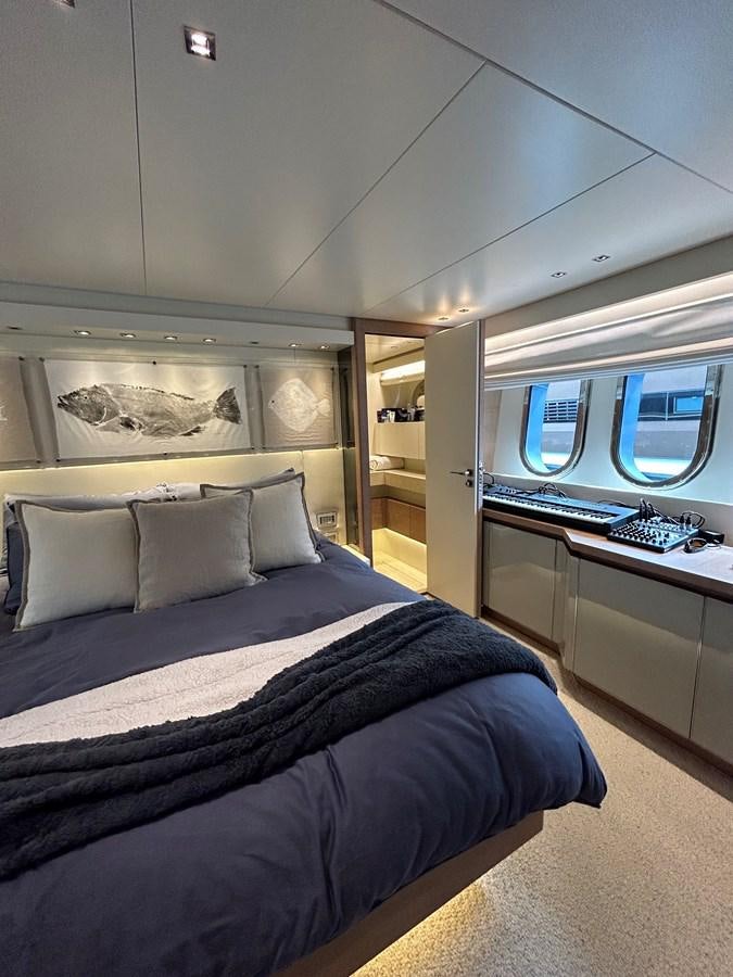a bed in a room aboard KIND OF BLUE Yacht for Sale