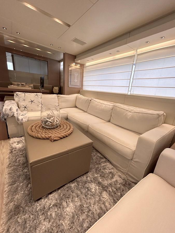 a living room with a couch aboard KIND OF BLUE Yacht for Sale