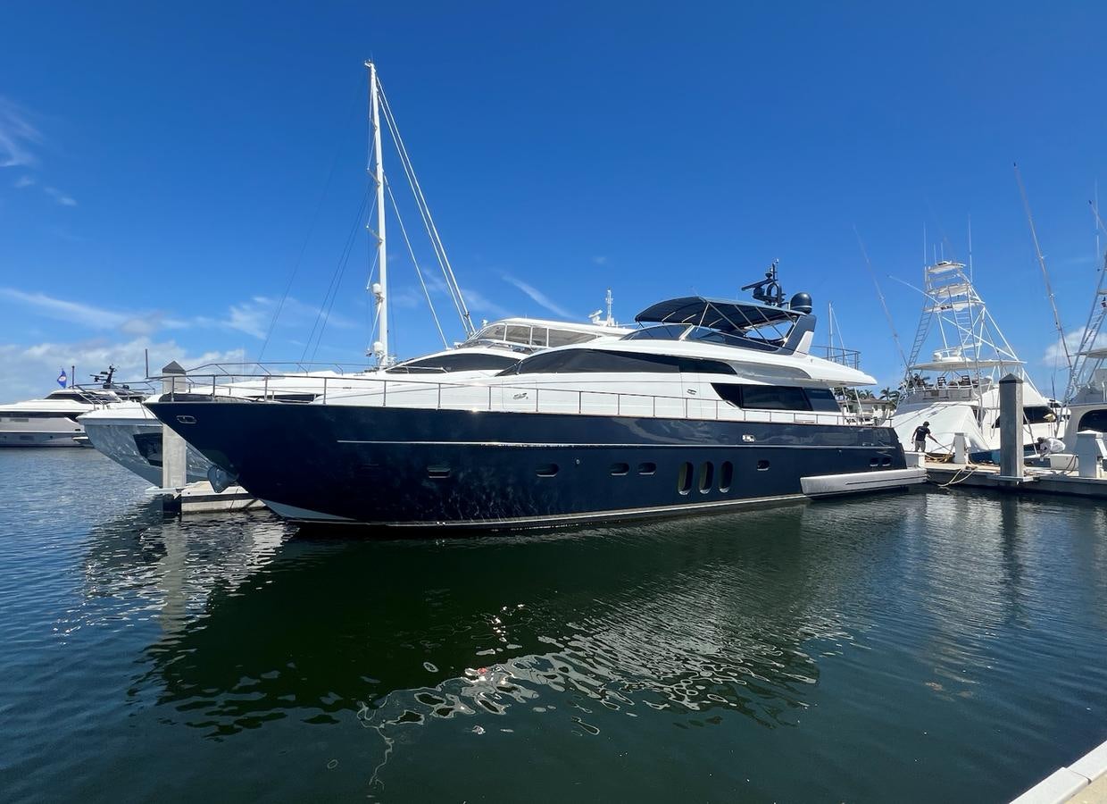 a large white boat in the water aboard KIND OF BLUE Yacht for Sale