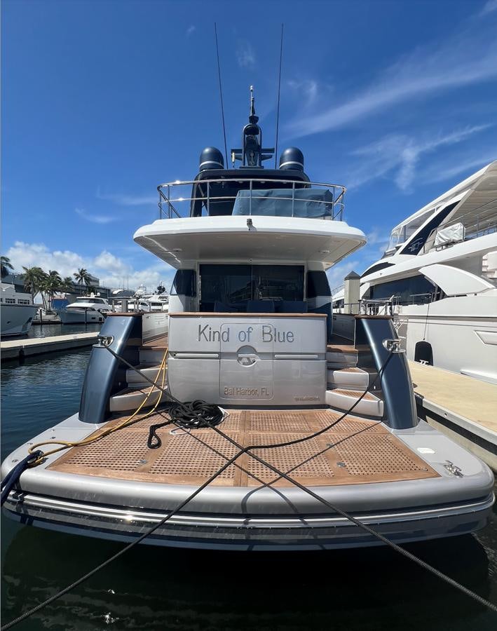a boat docked at a pier aboard KIND OF BLUE Yacht for Sale