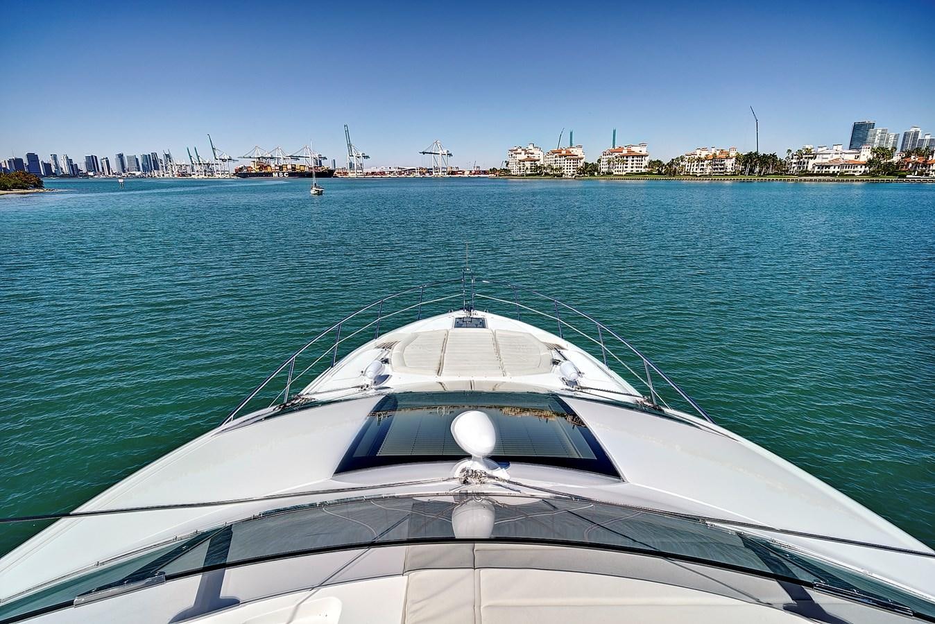a white boat in the water aboard KING Yacht for Sale