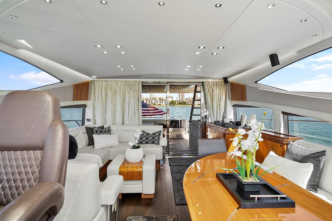 a living room with a large window aboard KING Yacht for Sale