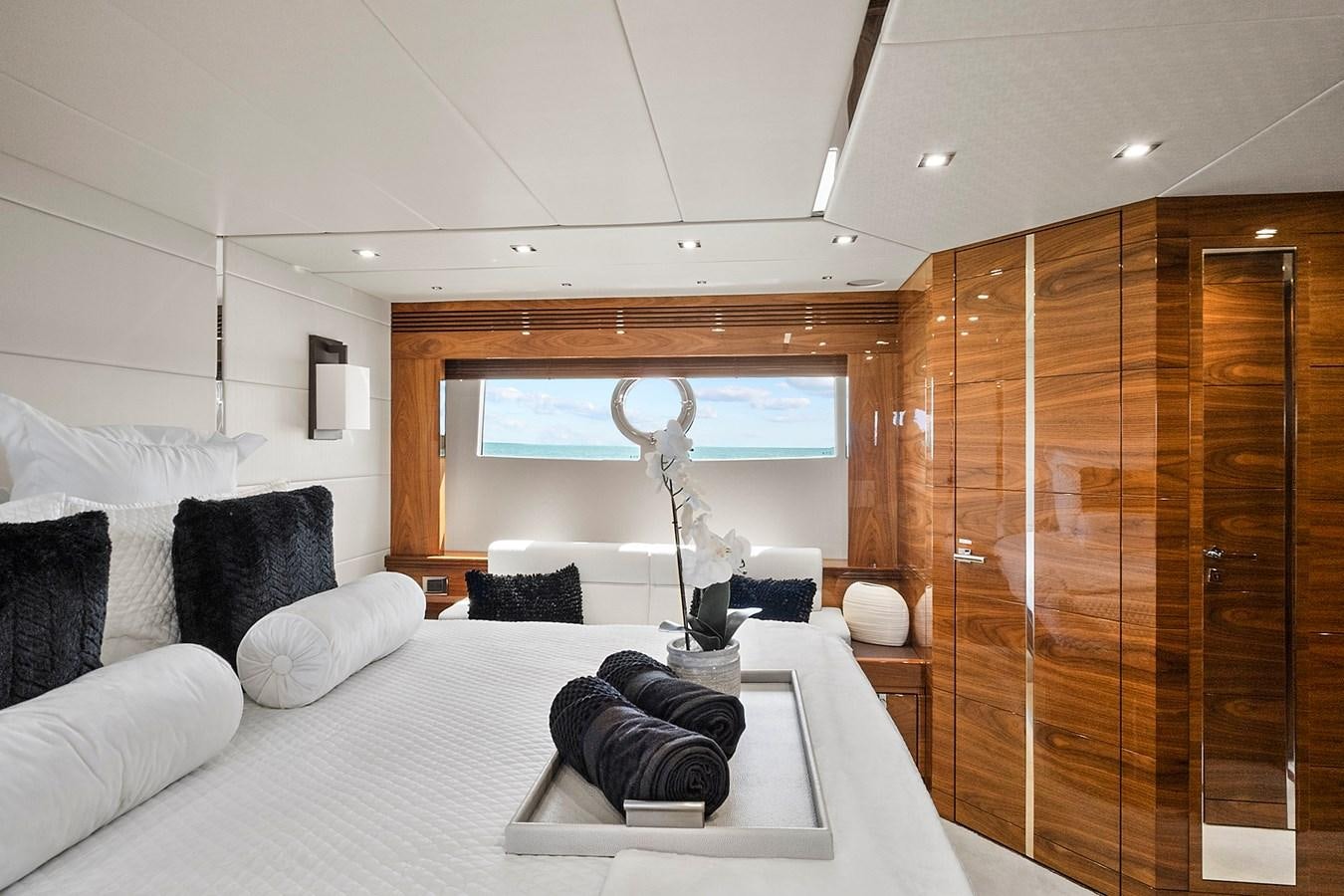 a room with a bed and a tv aboard KING Yacht for Sale