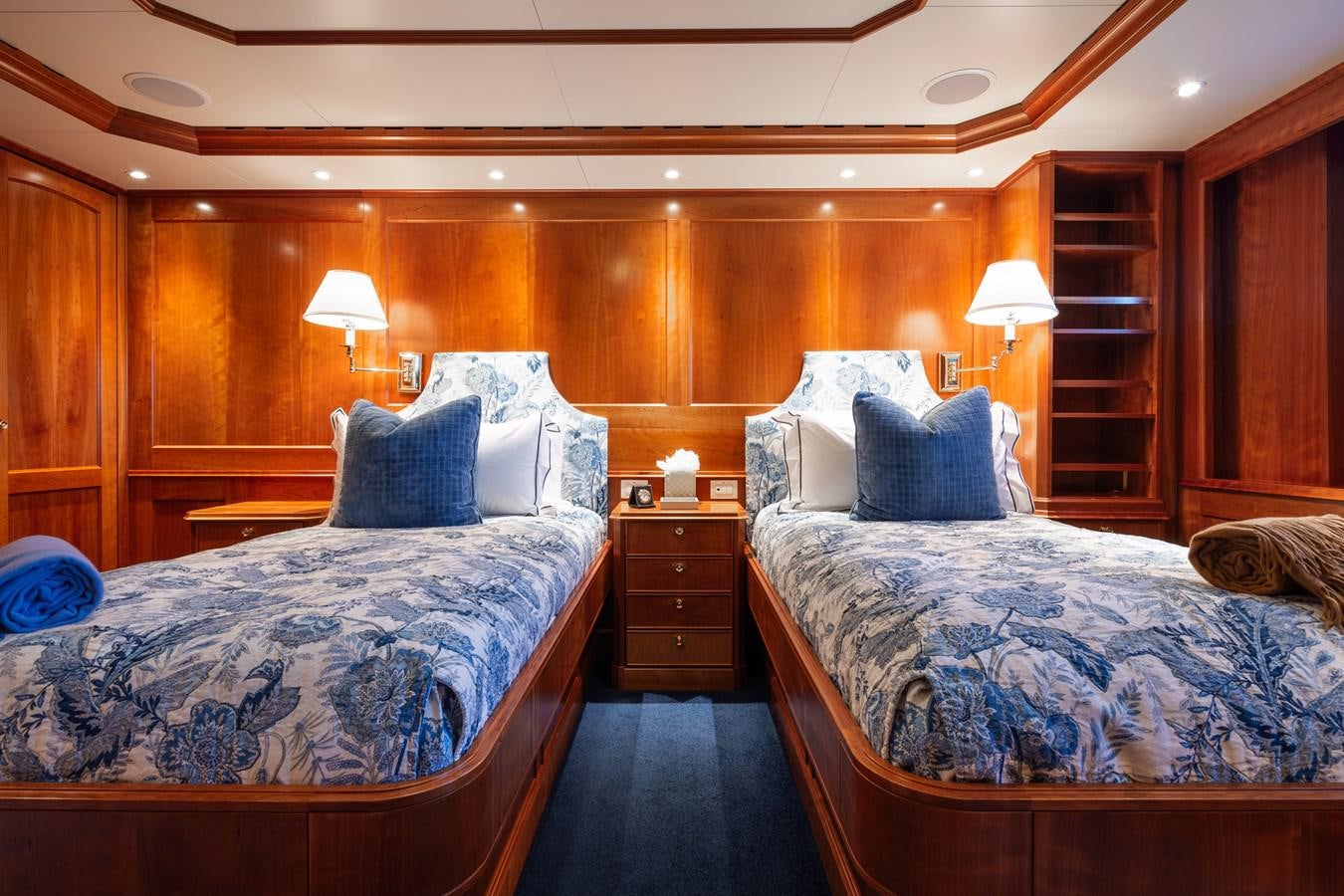 a couple of beds in a room aboard CUPANI Yacht for Sale