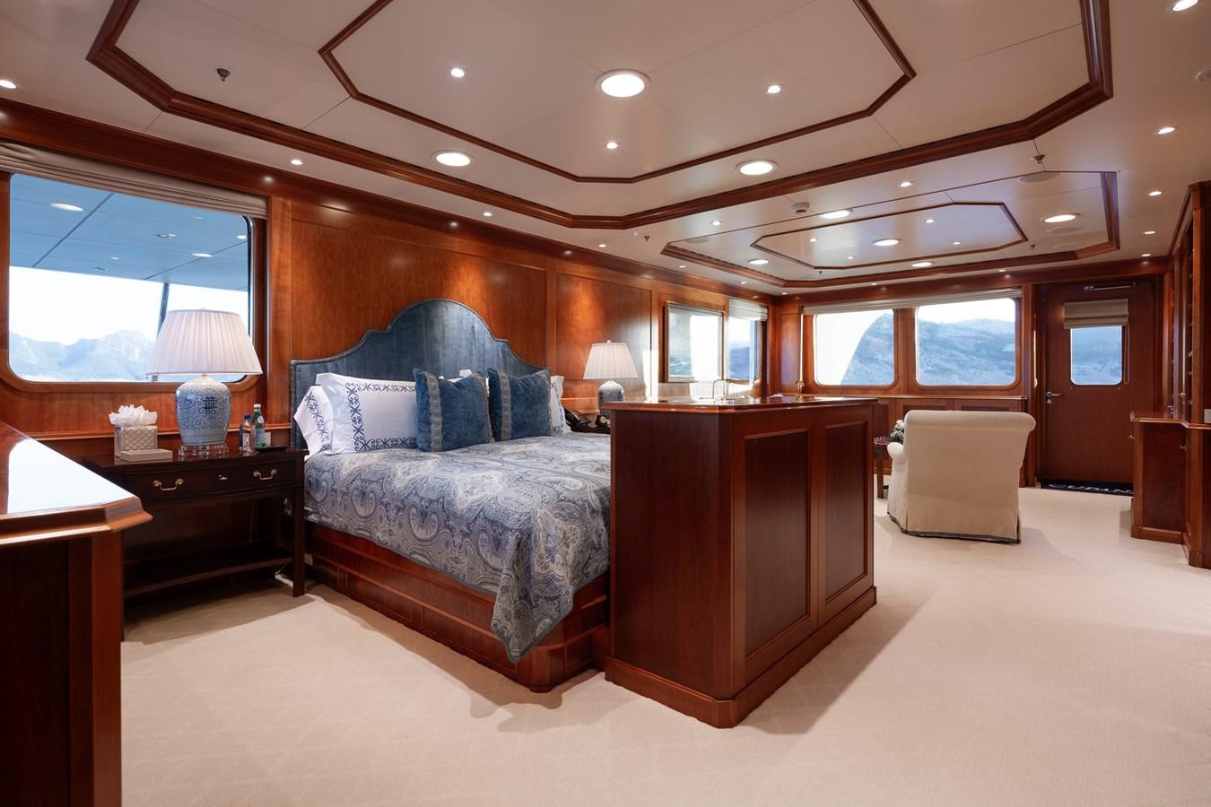 a large bedroom with a large bed aboard CUPANI Yacht for Sale