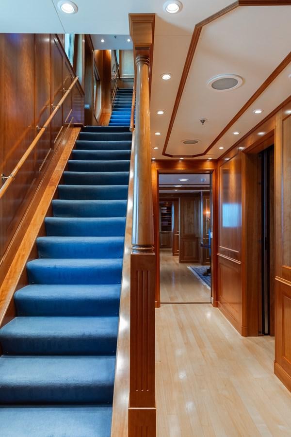 a set of stairs leading to a door aboard CUPANI Yacht for Sale