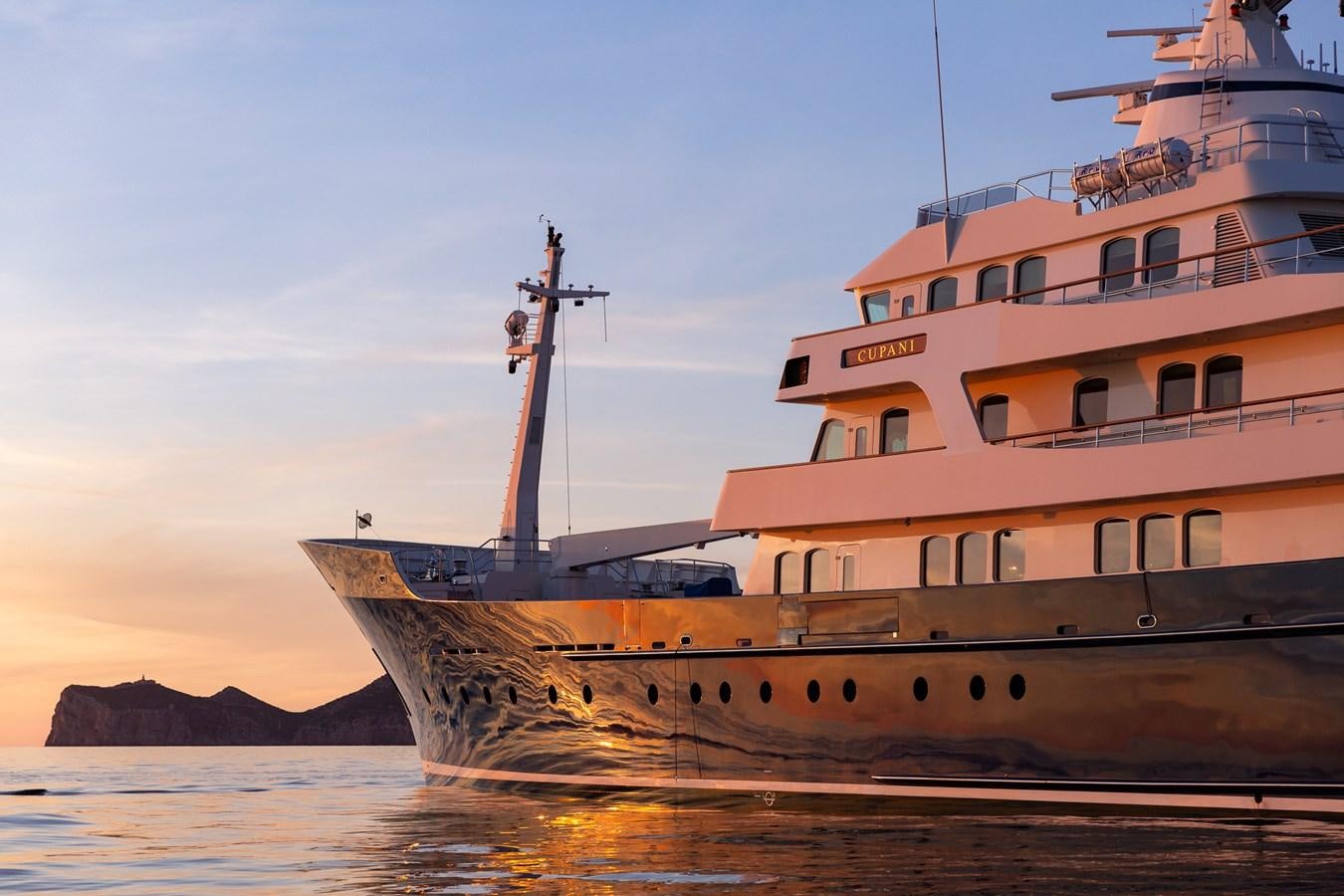 a large ship in the water aboard CUPANI Yacht for Sale