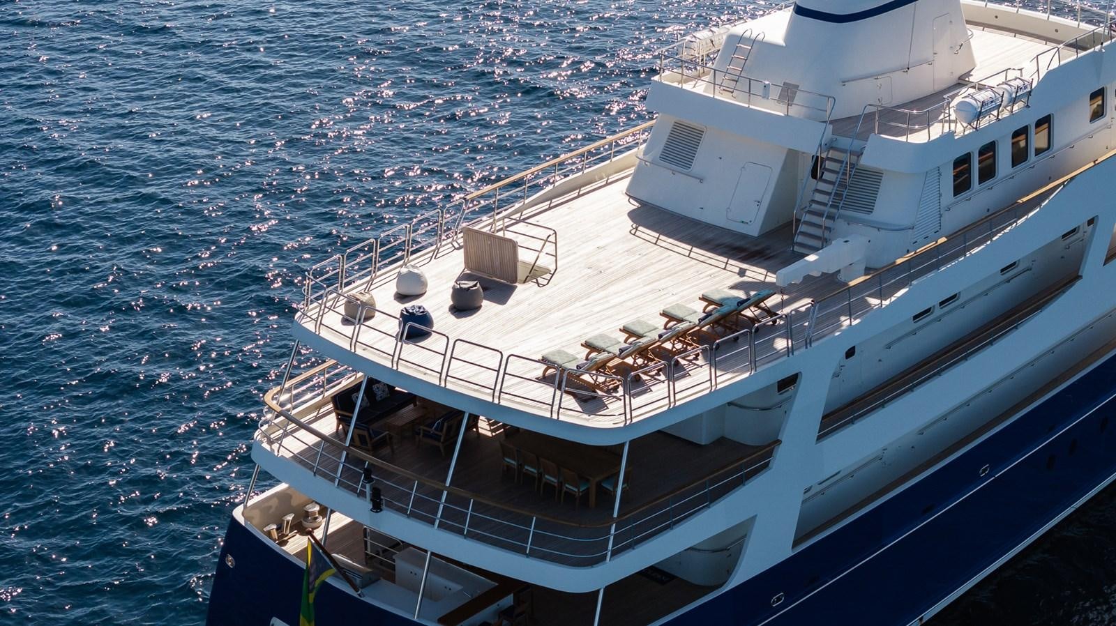 a large white boat in the water aboard CUPANI Yacht for Sale