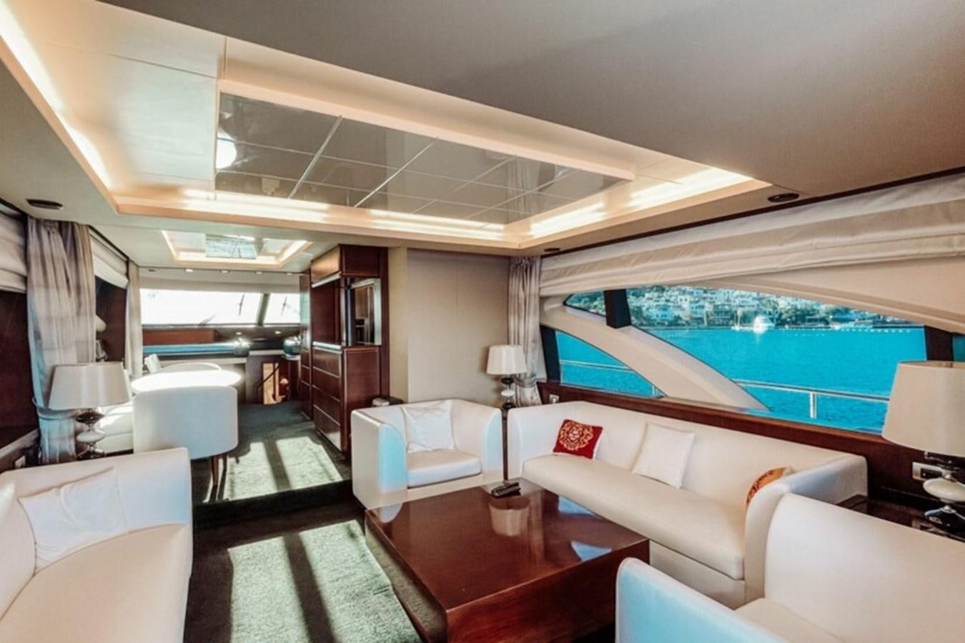 a living room with a large window aboard C Yacht for Sale