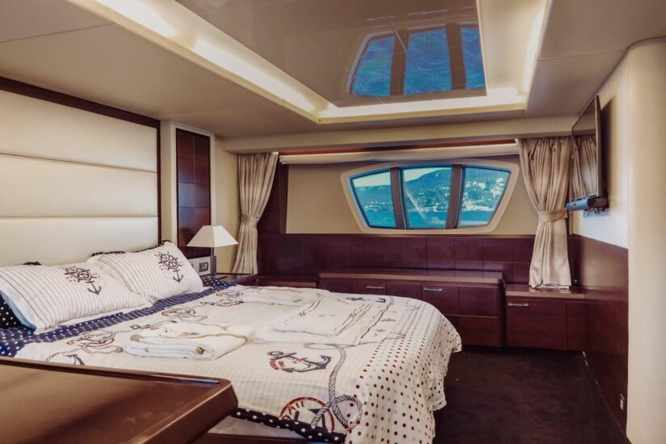 a couple of beds in a hotel room aboard C Yacht for Sale