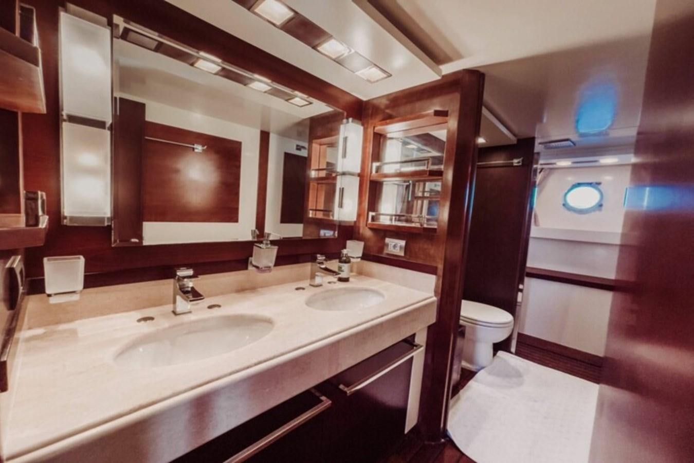 a bathroom with a sink and a toilet aboard C Yacht for Sale